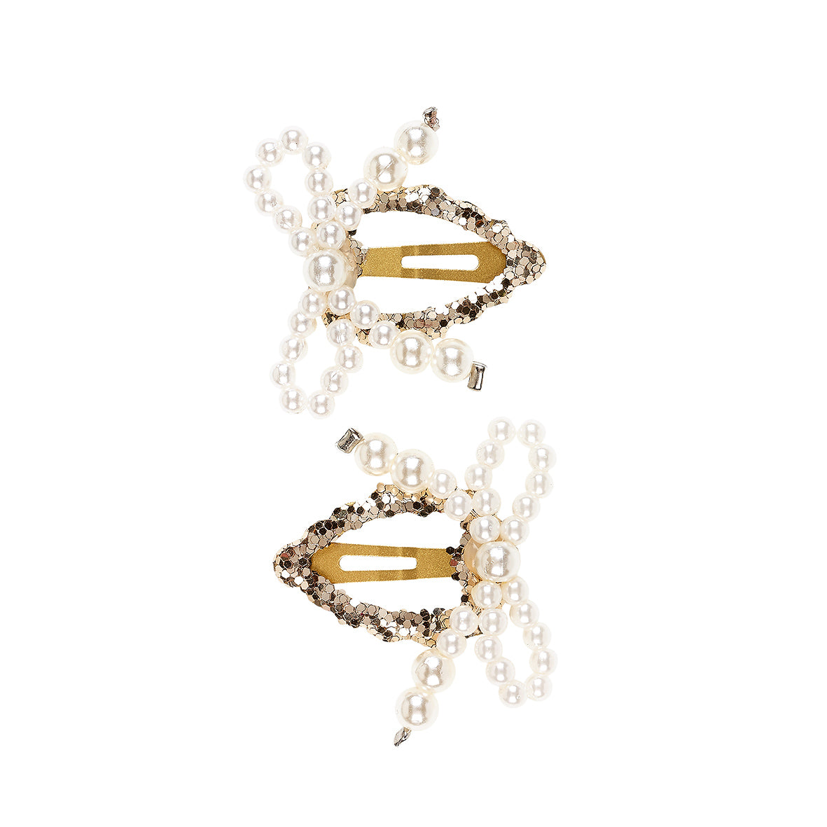 Two gold hair clips with pearl accents on a white background by Souza!