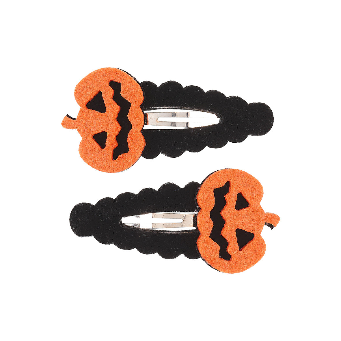 Two Halloween-themed pumpkin hair clips on a white background by Souza!